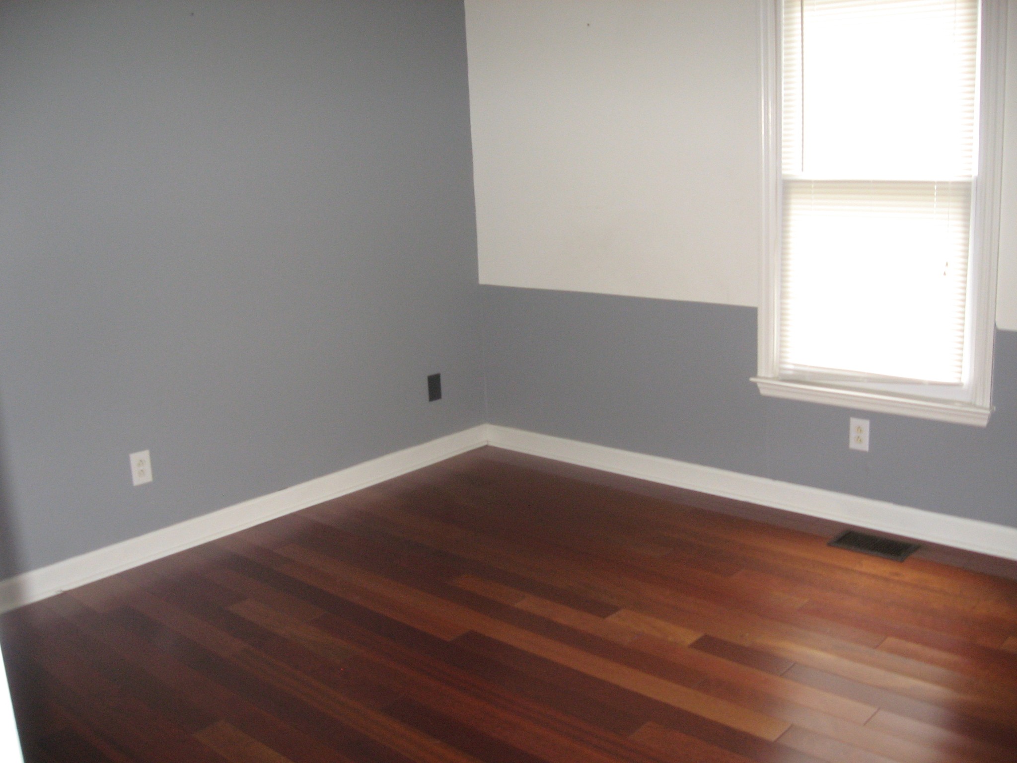 131 Savannah Ridge Murfreesboro, TN 37127 - Photo 7 of 9 an empty room with wooden floor and windows