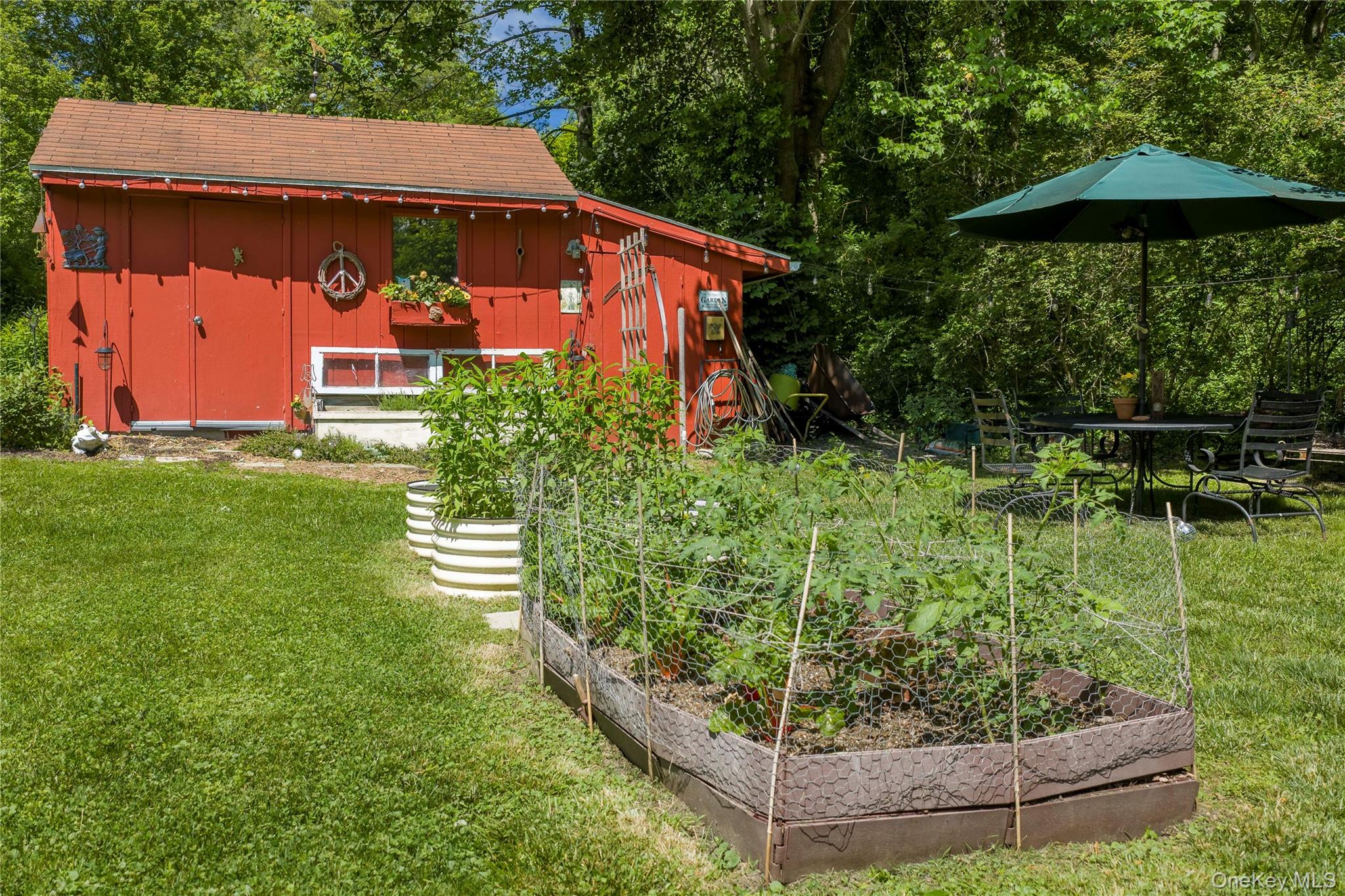 32 Cobb Road Brewster, NY 10509 - Photo 45 of 49 a backyard of a house with lots of green space