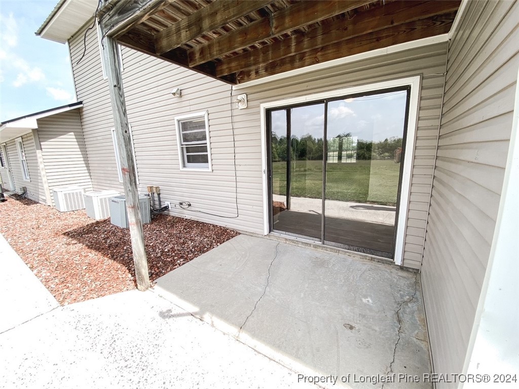 1829 Horne Camp Road, Unit 2 Fairmont, NC 28340 - Photo 16 of 18 a view of a porch