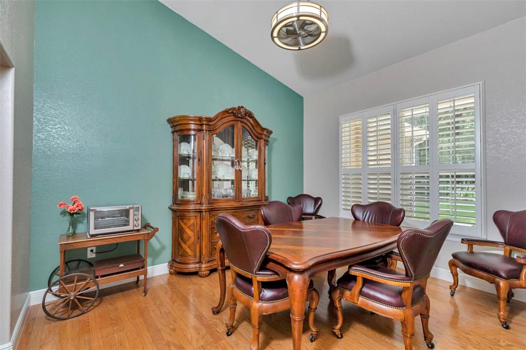 1989 Northwest 111th Loop Ocala, FL 34475 - Photo 13 of 55 a view of a dining room with furniture and a window