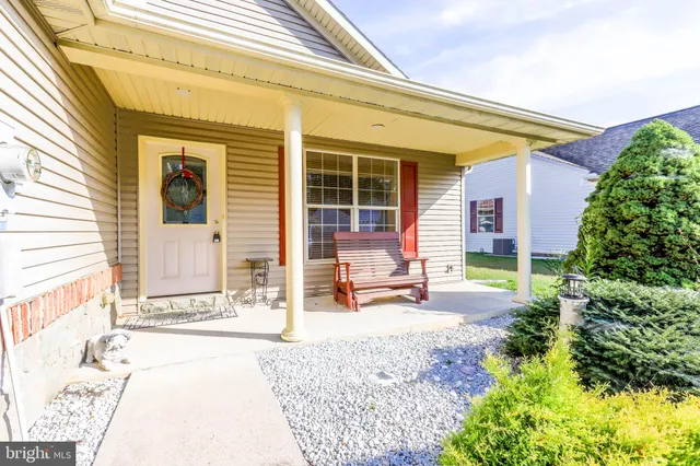 a front view of a house with patio