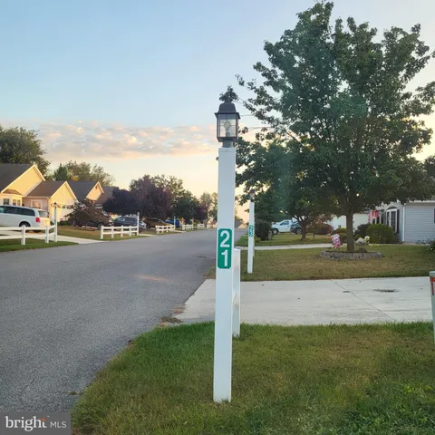 a view of street with houses