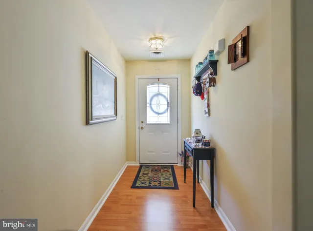 a view of livingroom with hardwood floor and a flat screen tv