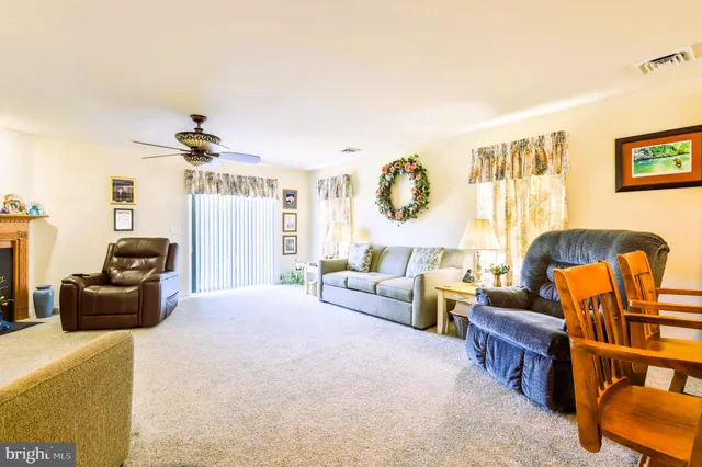 a spacious bedroom with a bed and a couch