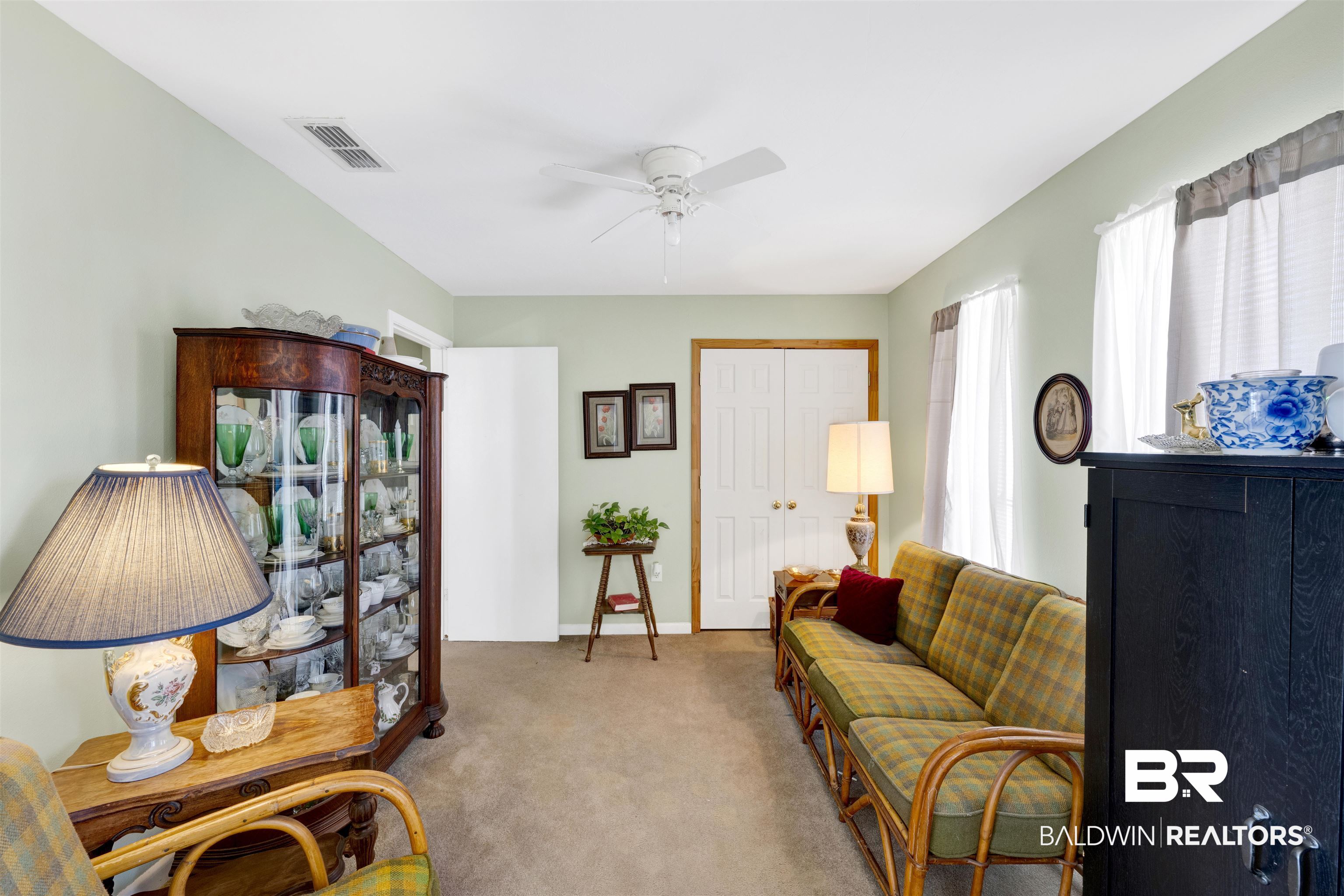 26222 Marina Road Orange Beach, AL 36561 - Photo 17 of 38 Living area featuring carpet and ceiling fan
