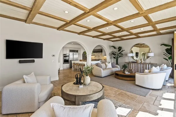 a living room with large windows