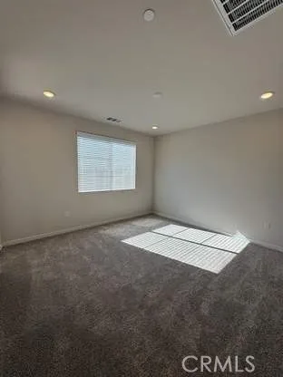 an empty room with an entryway