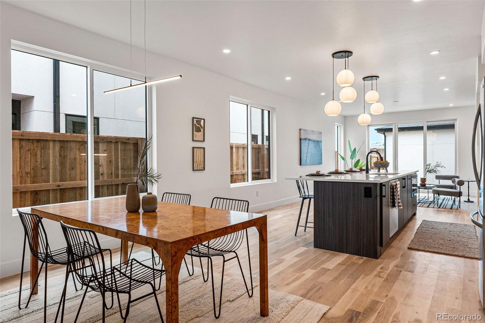 2410 South Bannock Street Denver, CO 80223 - Photo 15 of 40 a dining hall view with a large dining table and chairs