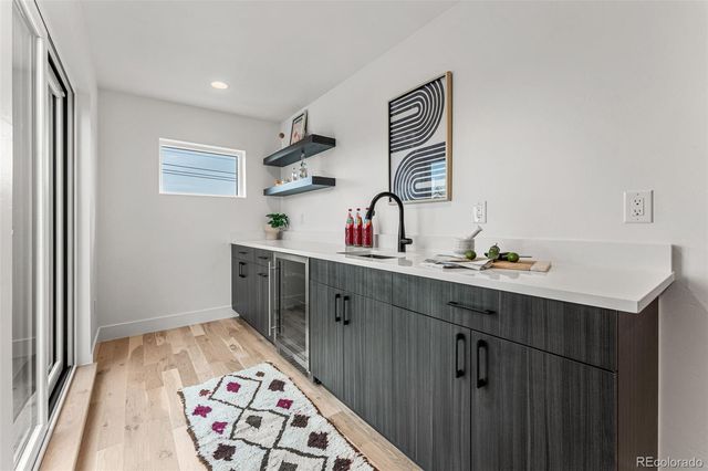a kitchen with a sink and a window