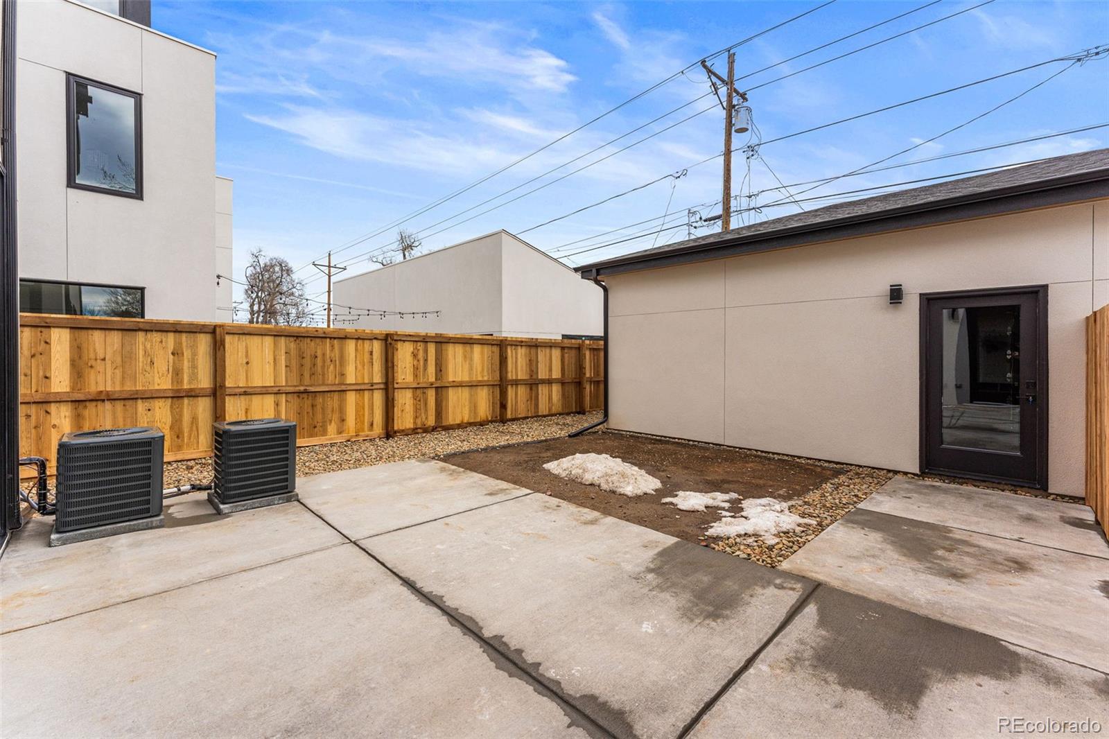2410 South Bannock Street Denver, CO 80223 - Photo 38 of 40 a view of a terrace with sky view