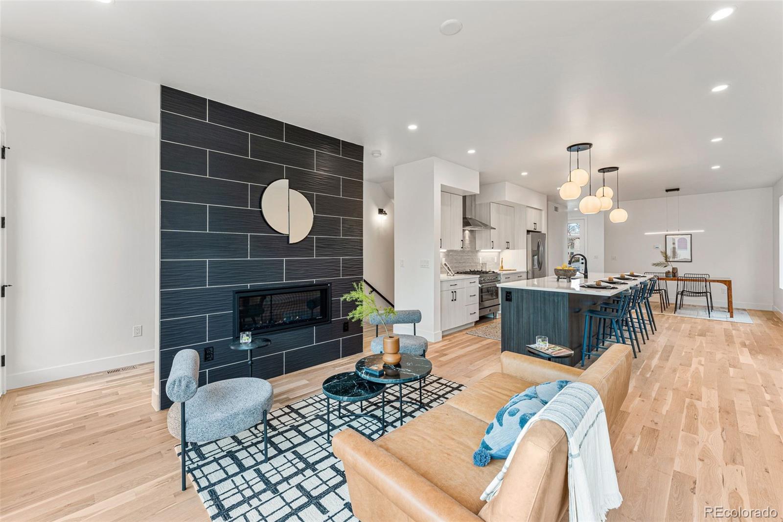 2410 South Bannock Street Denver, CO 80223 - Photo 6 of 40 a living room with furniture