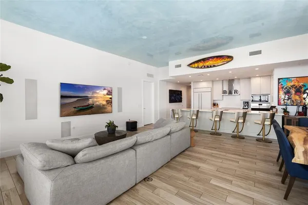 a bathroom with a double vanity sink toilet and shower