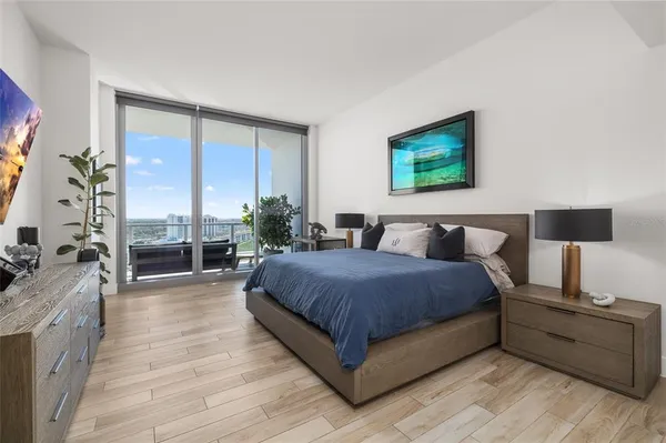 a bathroom with a tub and shower
