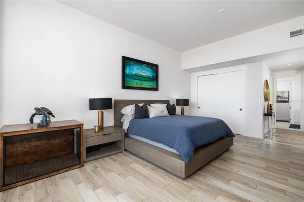 a view of a swimming pool and outdoor seating