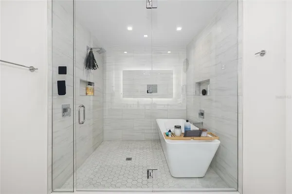 a view of a patio with a patio and swimming pool