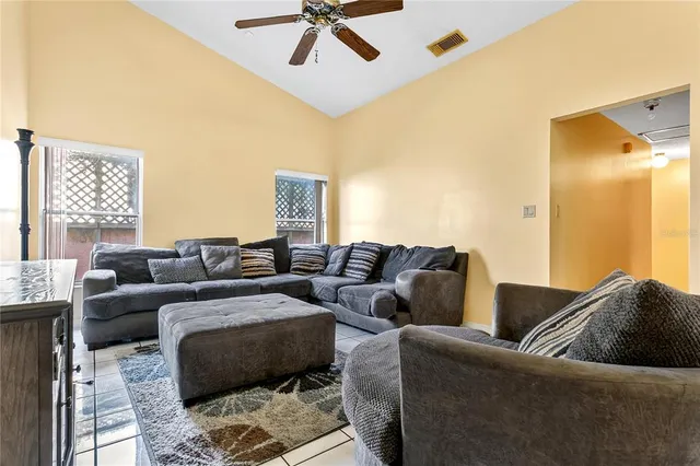 a living room with furniture and a couch