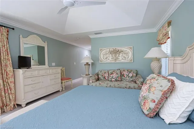 a bedroom with furniture and a bed