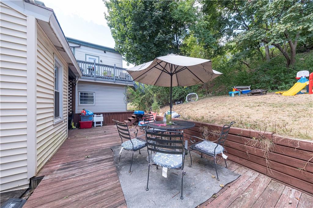 33 5th Street Pittsburgh, PA 15215 - Photo 22 of 32 an outdoor space with furniture and umbrella