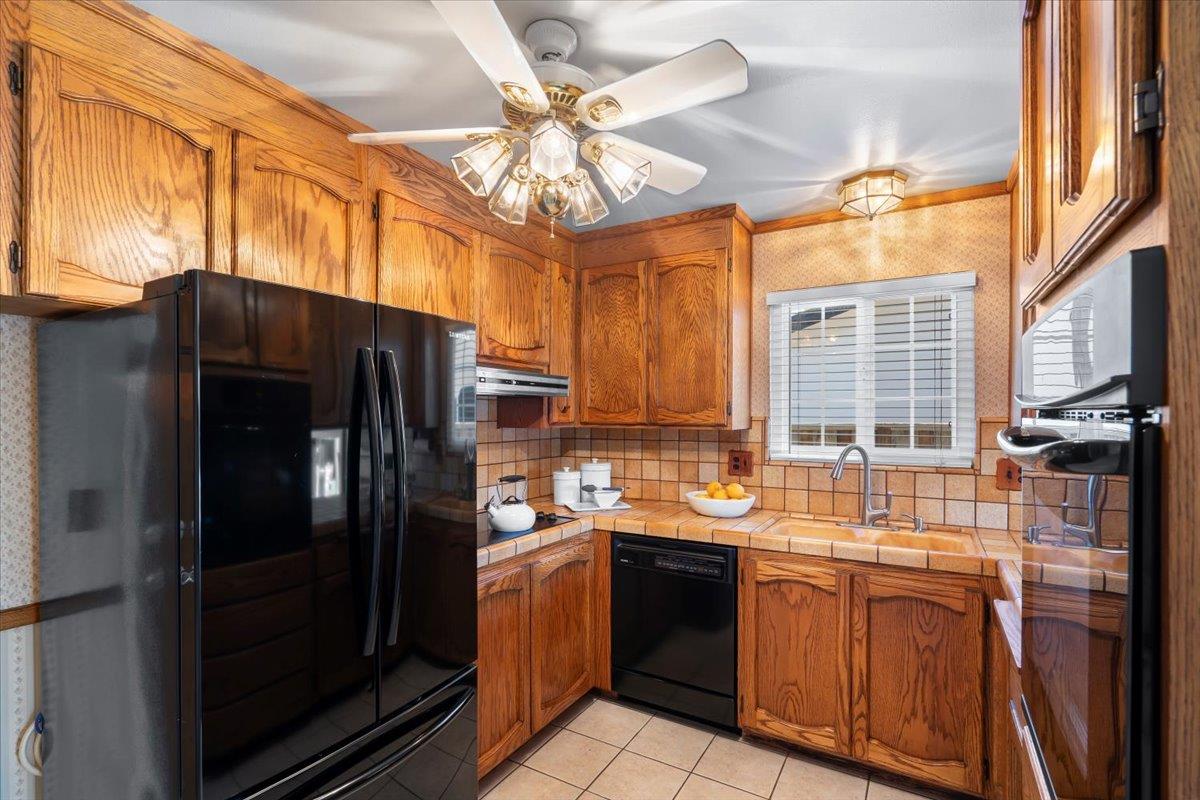 1470 Inskip Drive Campbell, CA 95008 - Photo 11 of 43 a kitchen with stainless steel appliances a stove a refrigerator and a sink
