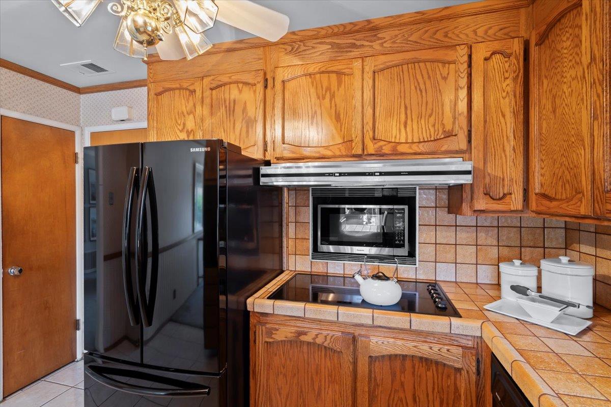 1470 Inskip Drive Campbell, CA 95008 - Photo 12 of 43 a kitchen with stainless steel appliances granite countertop a refrigerator and a stove top oven
