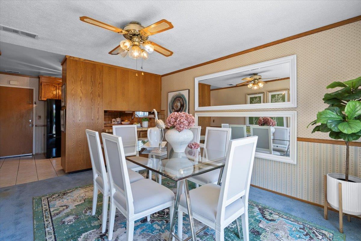 1470 Inskip Drive Campbell, CA 95008 - Photo 16 of 43 a dining room with furniture potted plants and wooden floor