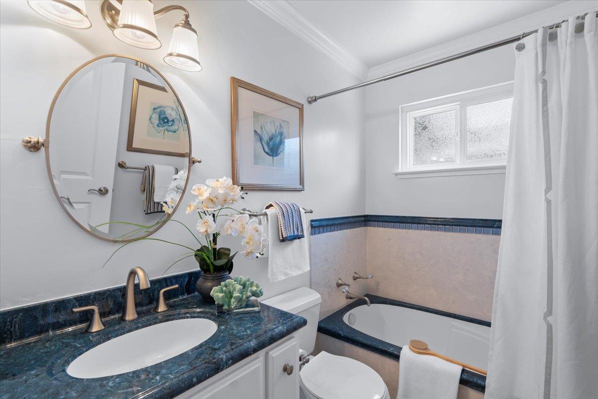 1470 Inskip Drive Campbell, CA 95008 - Photo 23 of 43 a bathroom with a toilet a sink and mirror