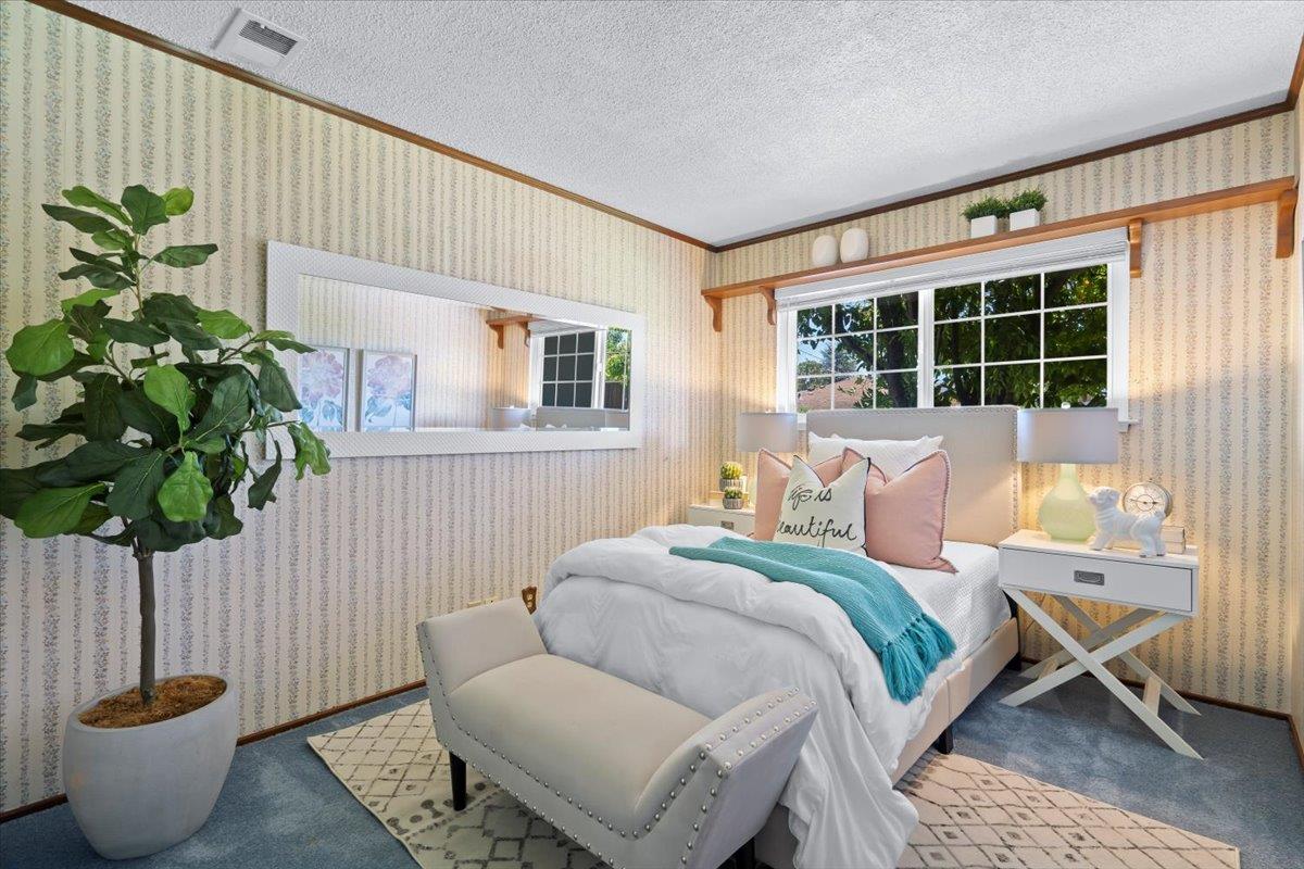 1470 Inskip Drive Campbell, CA 95008 - Photo 25 of 43 a bed room with a bed and a potted plant