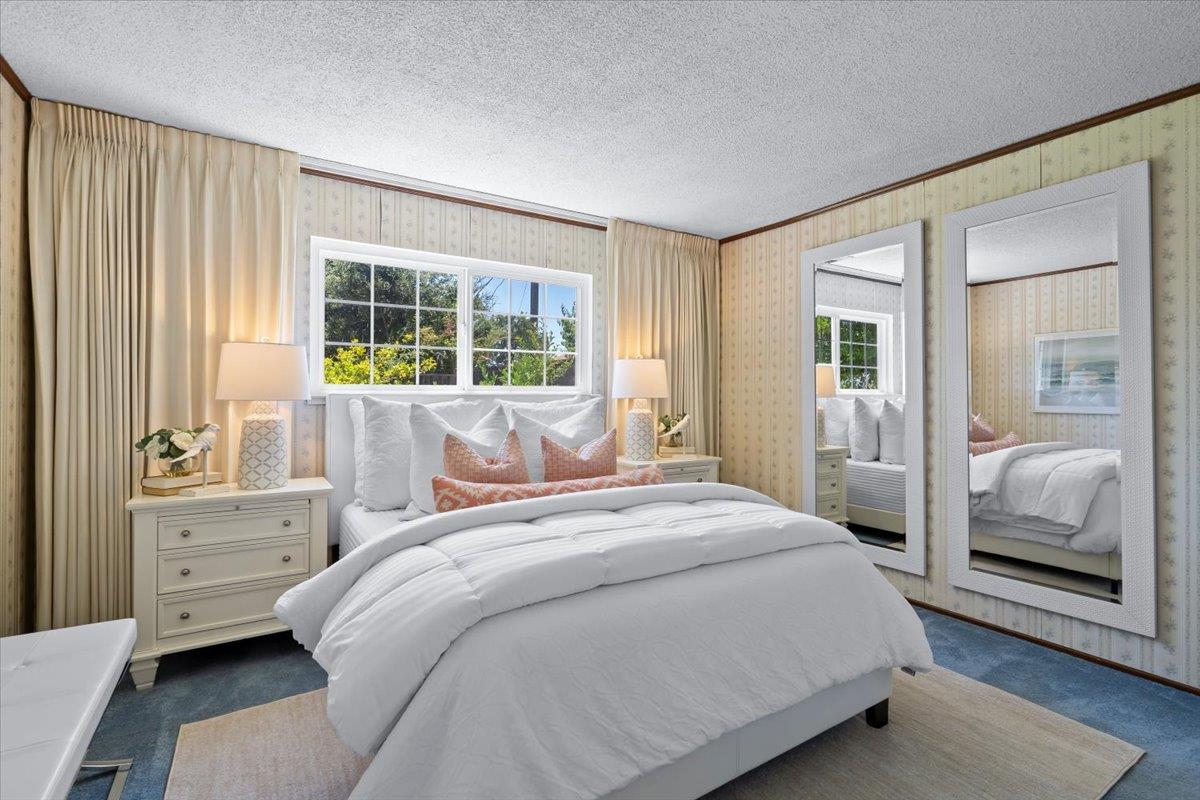 1470 Inskip Drive Campbell, CA 95008 - Photo 27 of 43 a bedroom with a bed and a large window