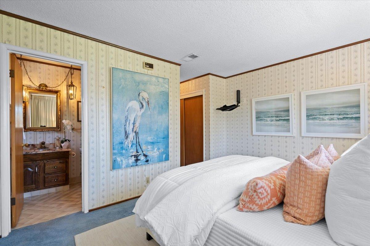1470 Inskip Drive Campbell, CA 95008 - Photo 30 of 43 a bedroom with a large bed and a window