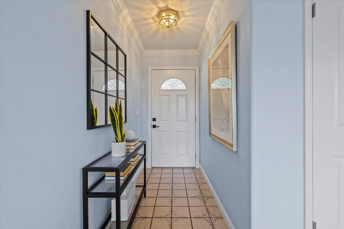 1470 Inskip Drive Campbell, CA 95008 - Photo 5 of 43 a view of a hallway and wooden floor with windows