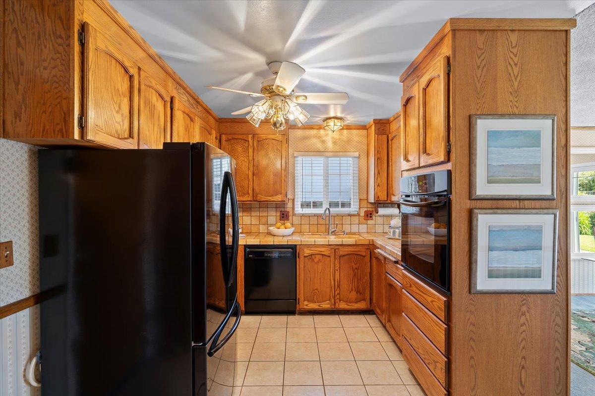 1470 Inskip Drive Campbell, CA 95008 - Photo 10 of 43 a kitchen with stainless steel appliances granite countertop a refrigerator and a sink