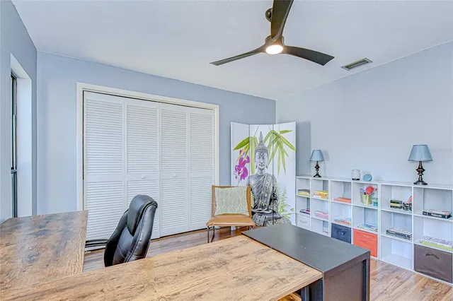 a workspace with furniture and window