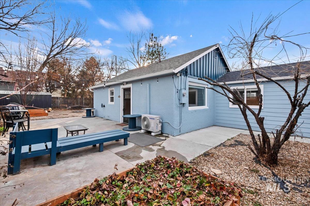 2837 Ona Street Boise, ID 83705 - Photo 10 of 26 Rear view of property featuring a patio area, board and batten siding, and roof with shingles