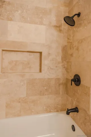 a view of yard with swimming pool and green space