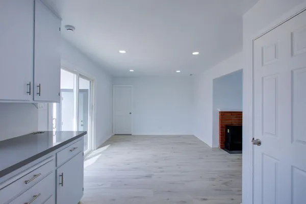 a view of an empty room with a window