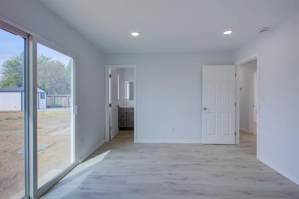 a view of hallway with a large window