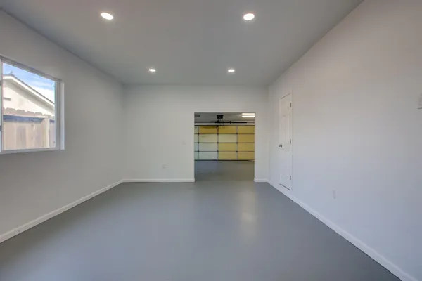 a view of a livingroom with a hallway