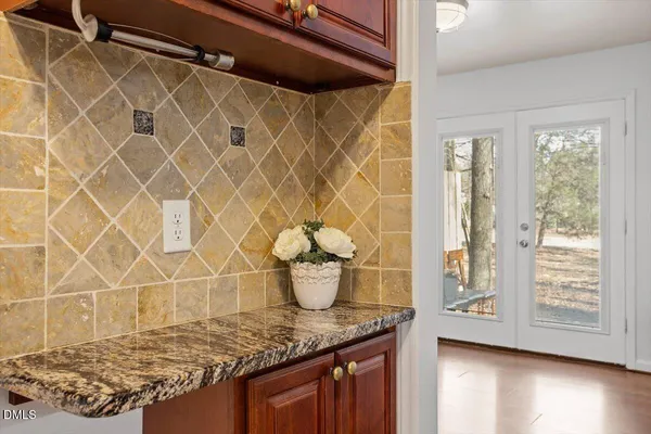 a kitchen with a sink and a stove