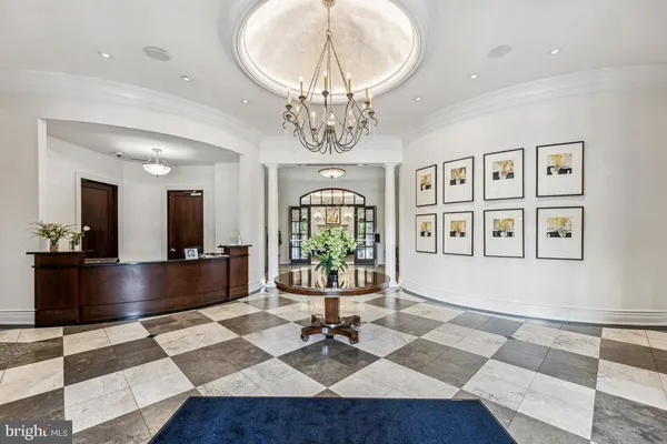 a view of a livingroom with furniture window and wooden floor