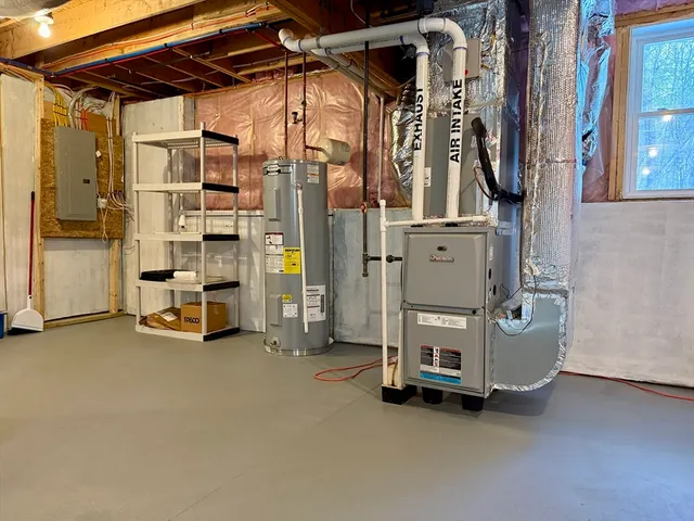 a view of a utility room with washing machine