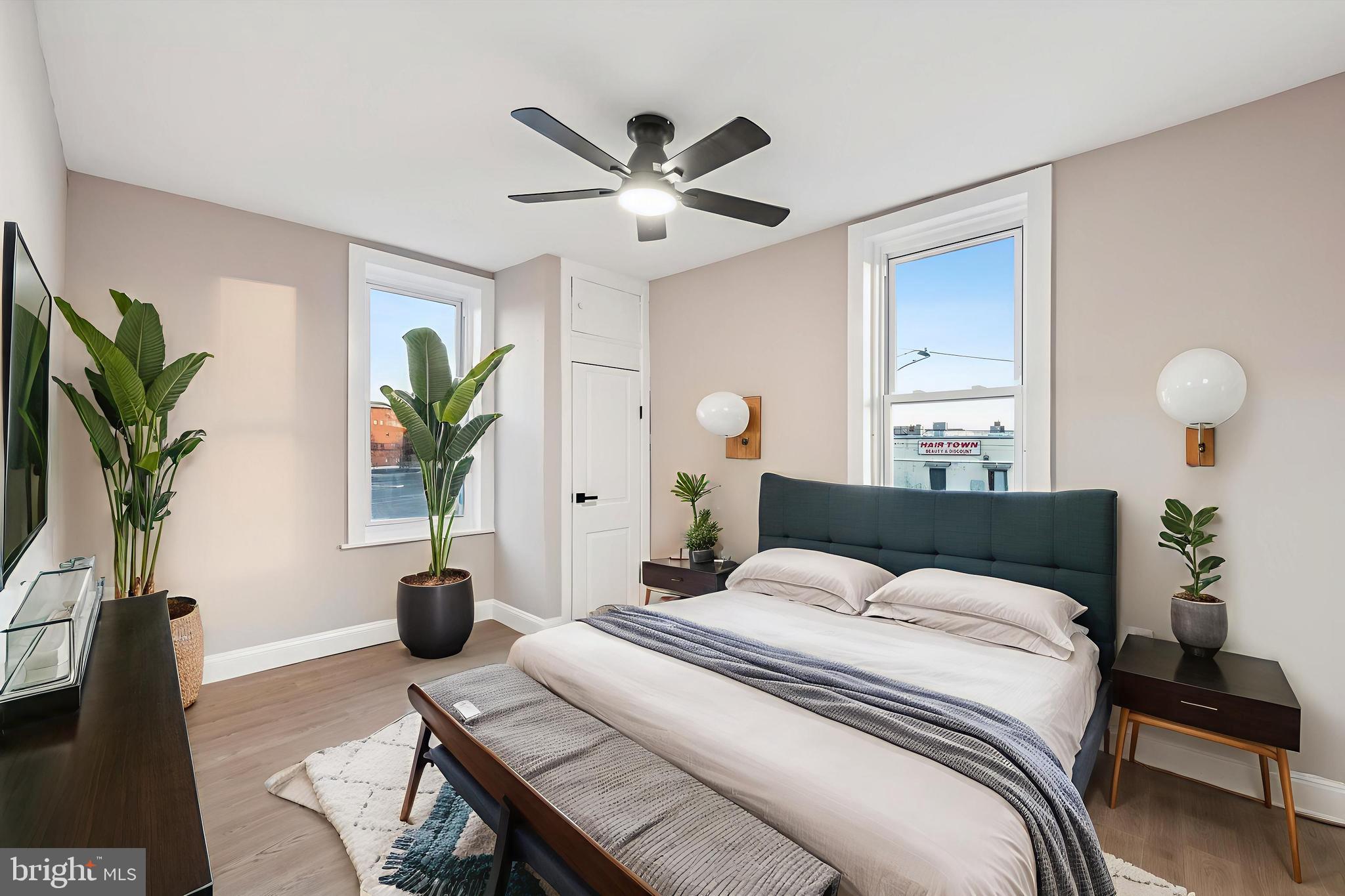 5614 Haverford Avenue Philadelphia, PA 19131 - Photo 11 of 19 a bedroom with a bed and a potted plant