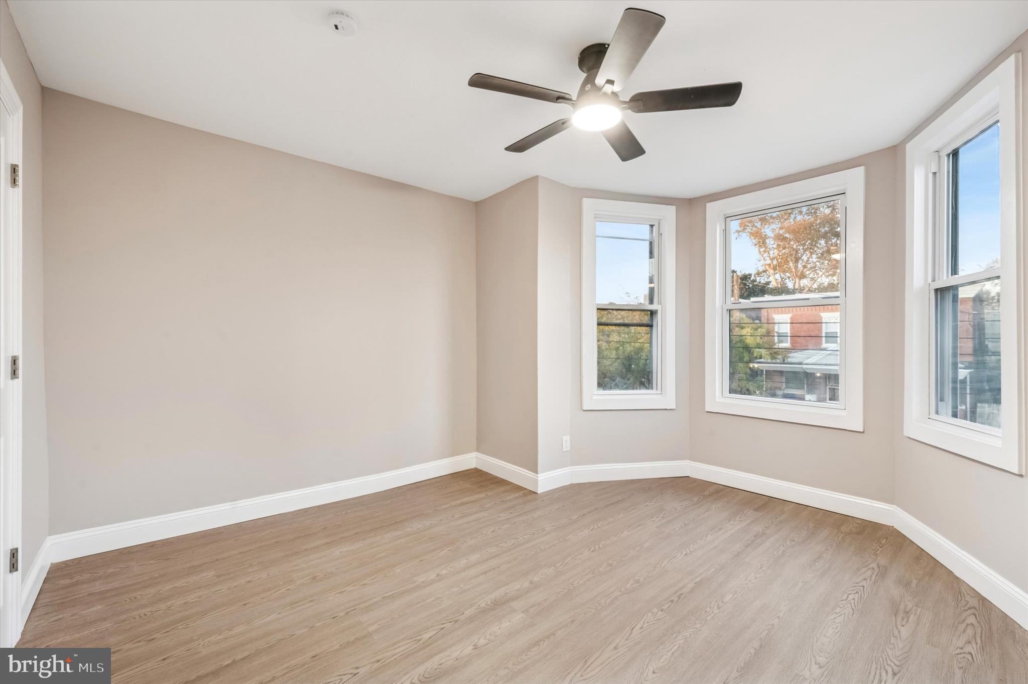 5614 Haverford Avenue Philadelphia, PA 19131 - Photo 17 of 19 a view of a big room with wooden floor and windows