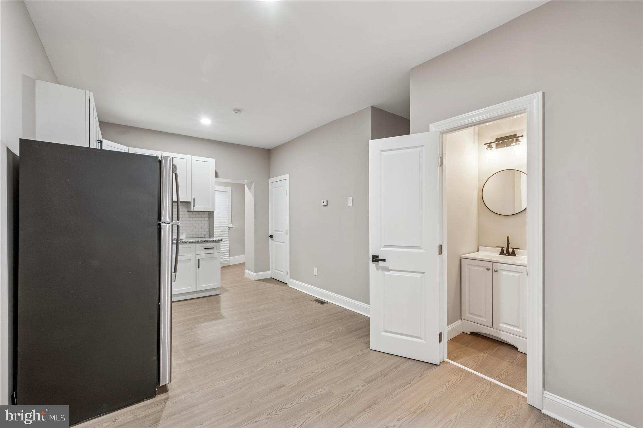 5614 Haverford Avenue Philadelphia, PA 19131 - Photo 5 of 19 a view of a kitchen with a refrigerator and a sink