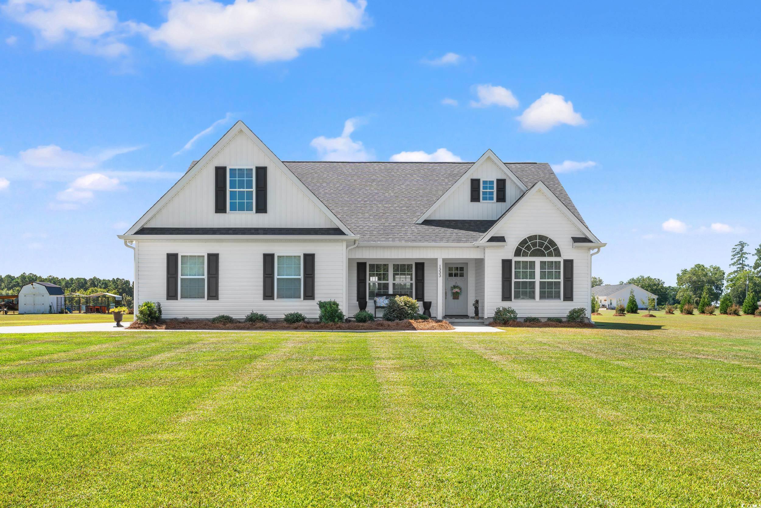 1333 Zion Road Aynor, SC 29544 - Photo 1 of 34 View of front of home featuring a storage shed and