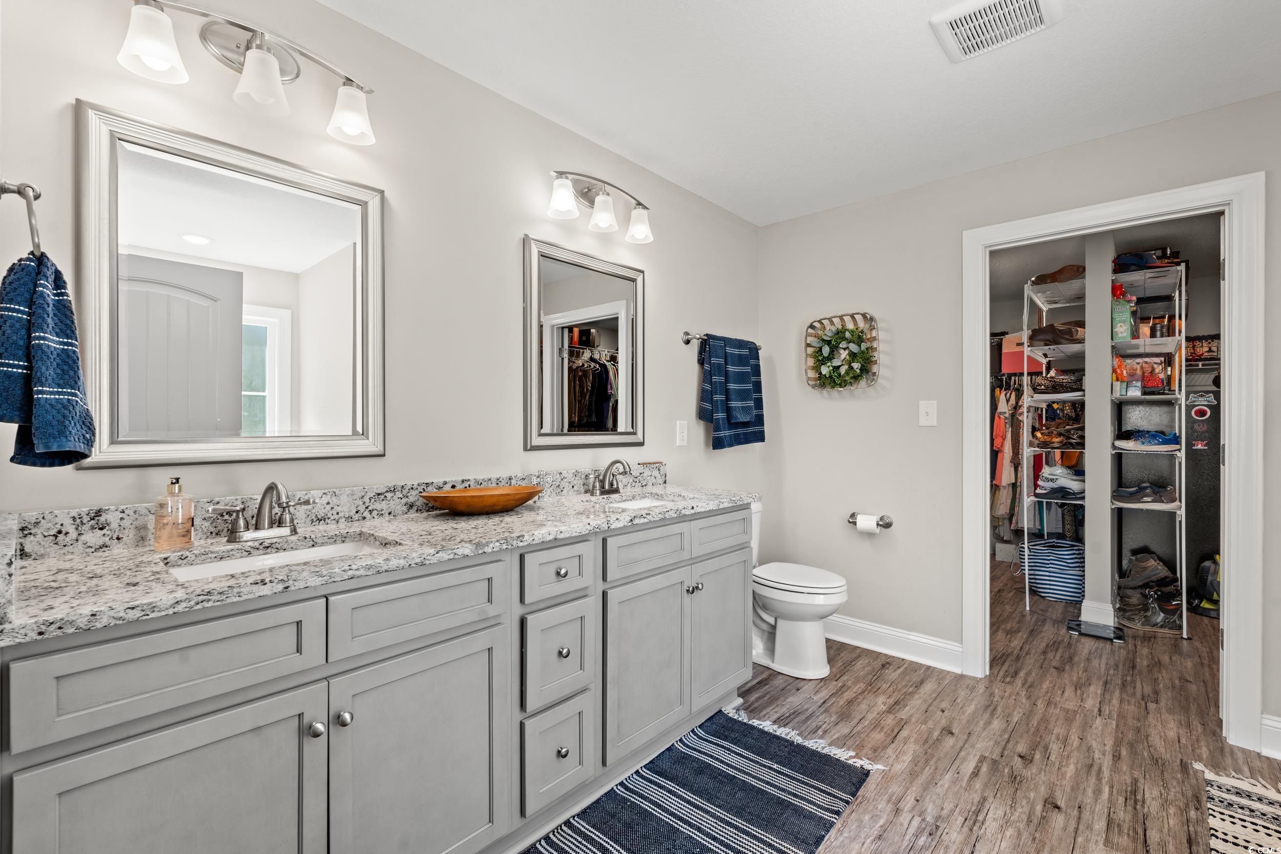1333 Zion Road Aynor, SC 29544 - Photo 14 of 34 Bathroom featuring hardwood / wood-style floors, t