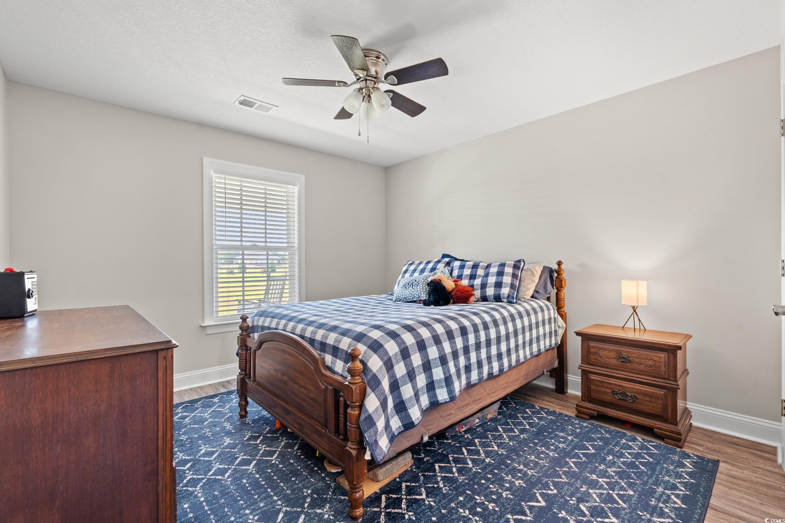 1333 Zion Road Aynor, SC 29544 - Photo 21 of 34 Bedroom with hardwood / wood-style flooring and ce