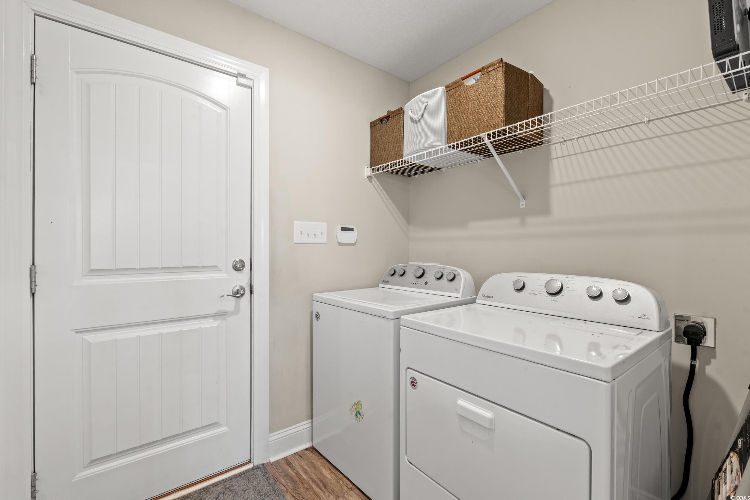 1333 Zion Road Aynor, SC 29544 - Photo 22 of 34 Clothes washing area featuring hardwood / wood-sty
