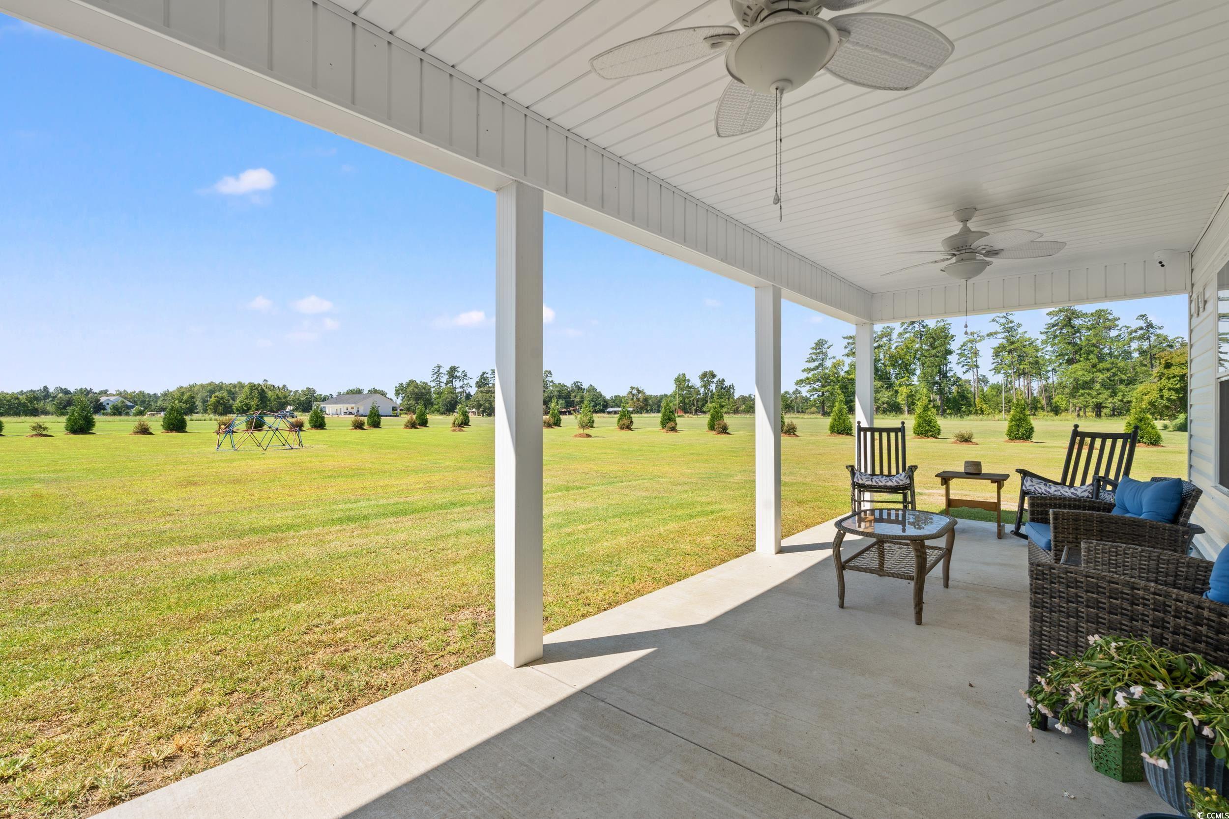 1333 Zion Road Aynor, SC 29544 - Photo 23 of 34 View of patio / terrace with ceiling fan