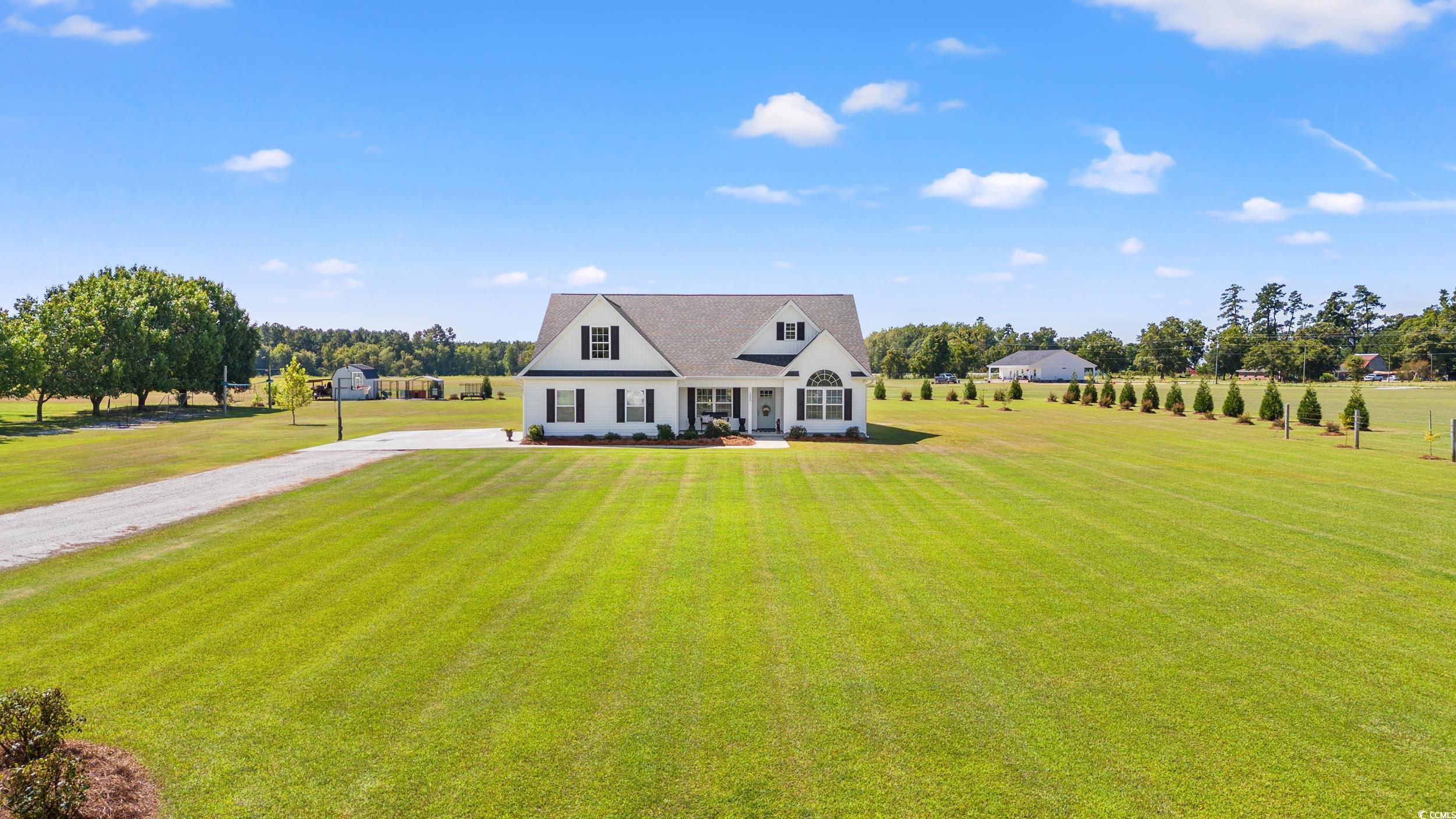 1333 Zion Road Aynor, SC 29544 - Photo 25 of 34 View of front of house with a front lawn and a rur