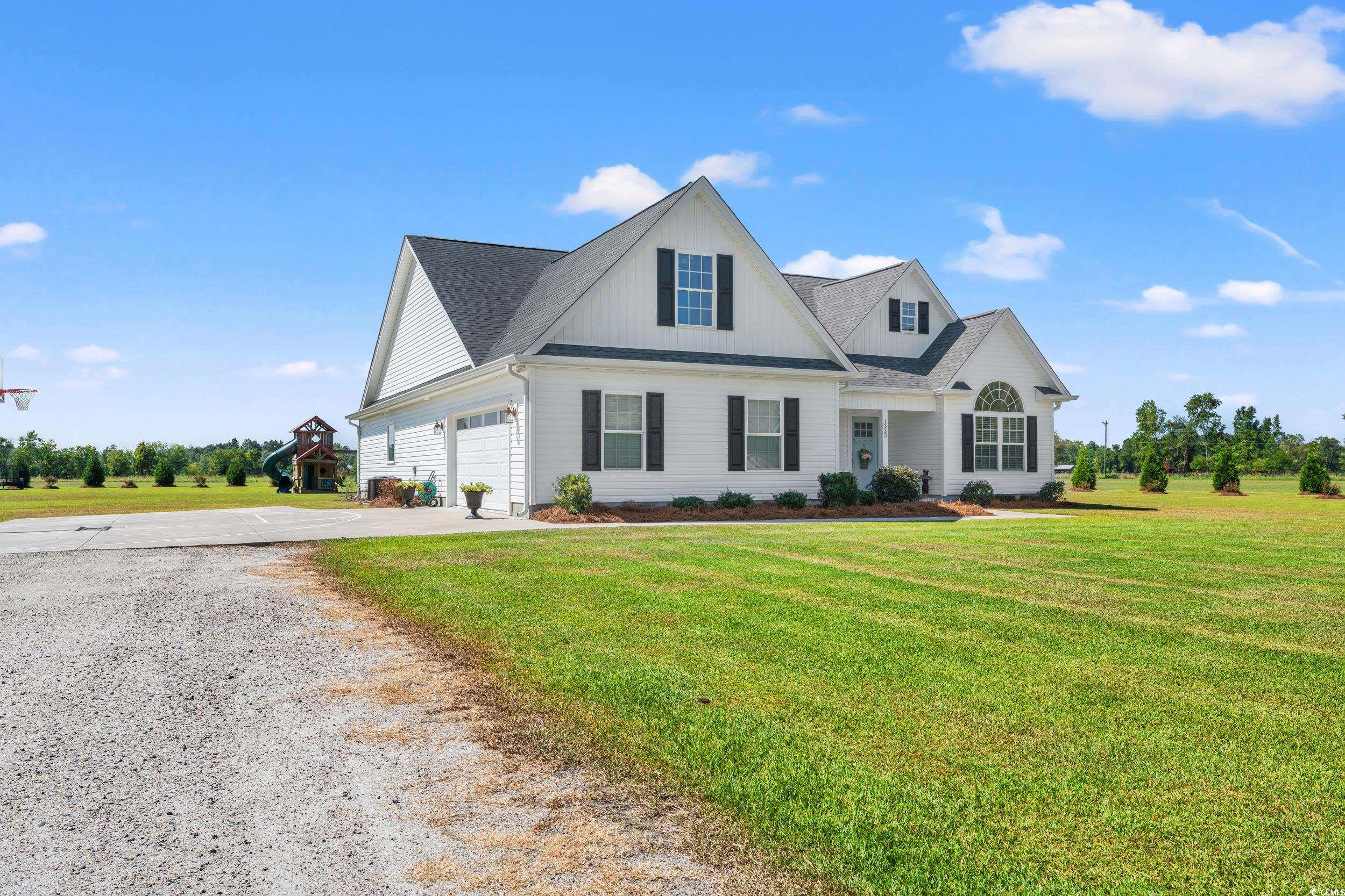 1333 Zion Road Aynor, SC 29544 - Photo 29 of 34 View of front facade with a front lawn